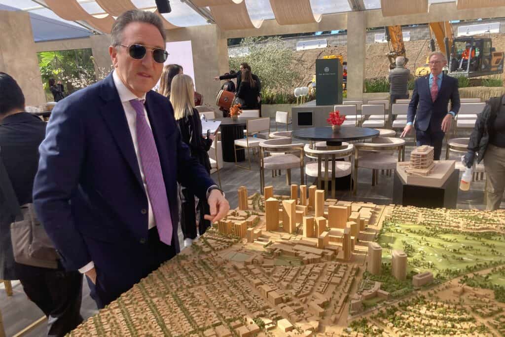 Jonathan Goldstein with a model of One Beverly Hills.
