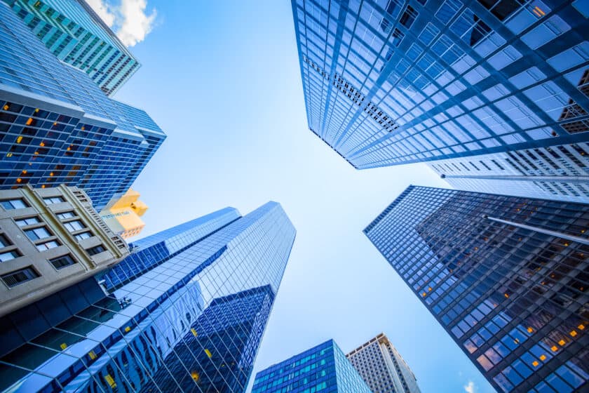 Looking up at city skyscrapers