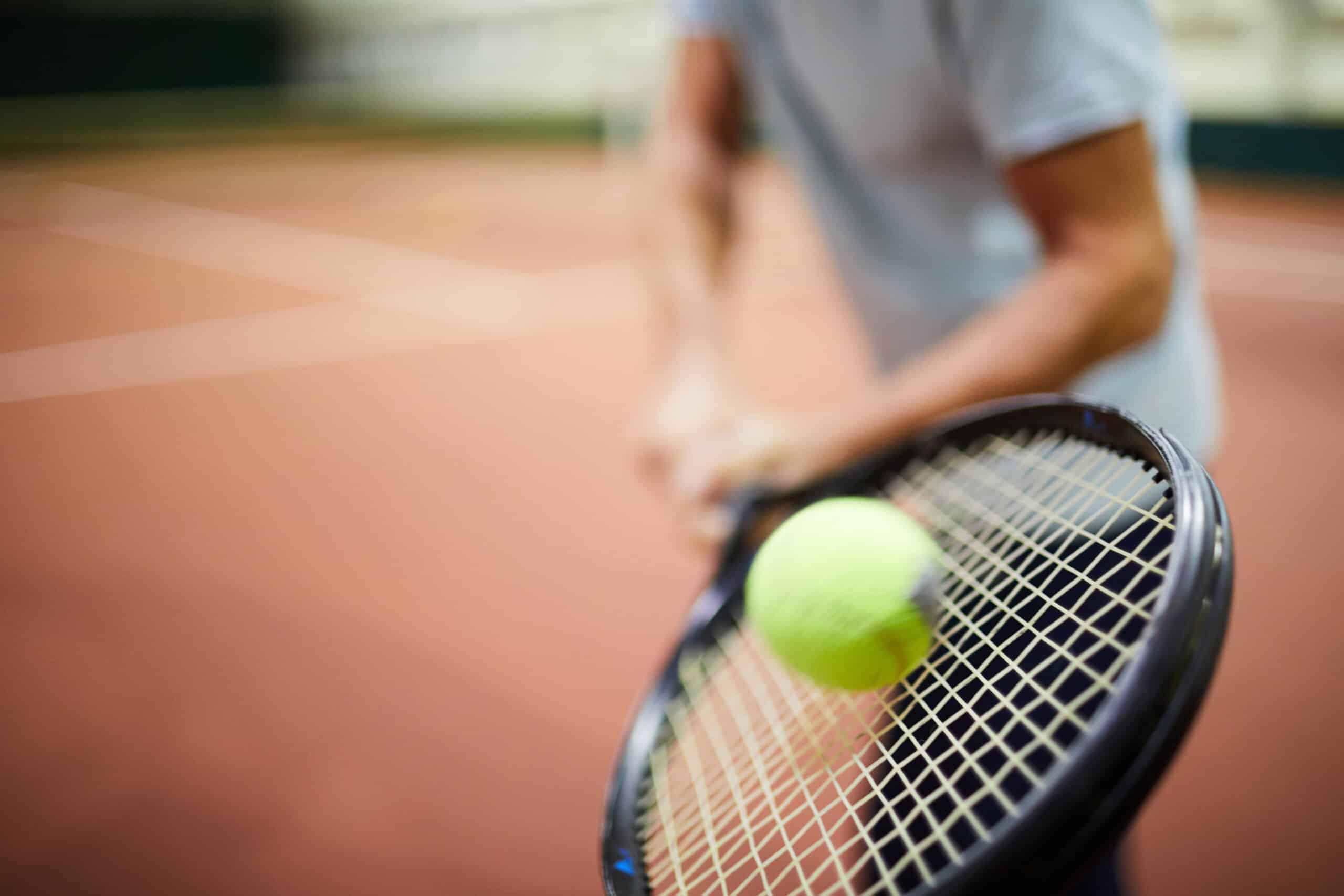 Playing tennis