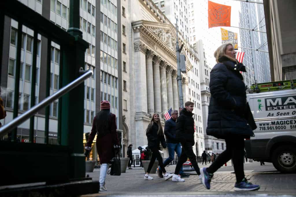 Pedestrians in front of the New York Stock Exchange