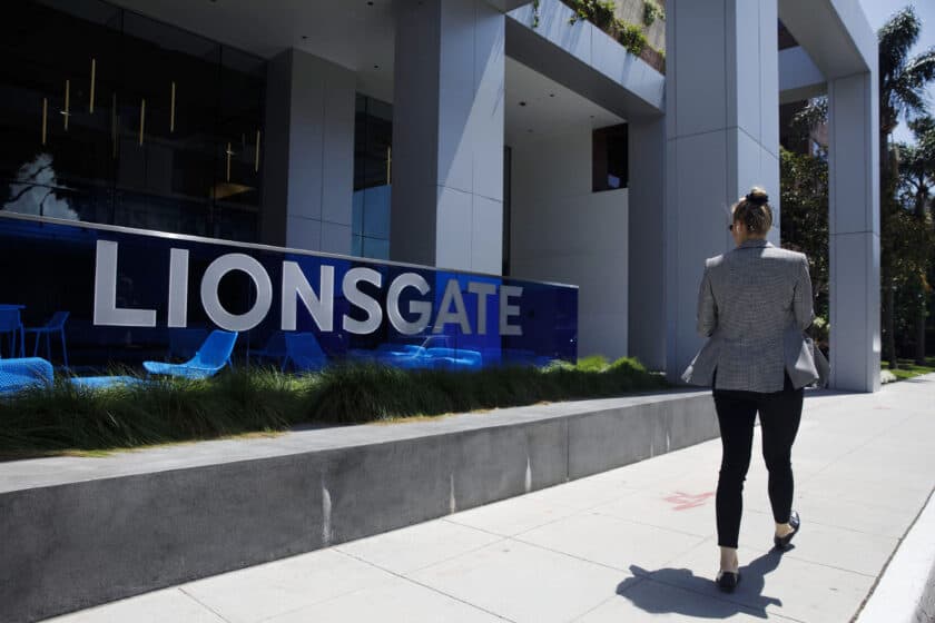 A pedestrian walks past Lions Gate Entertainment headquarters