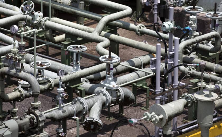 Pipes are seen near a liquefied natural gas tank