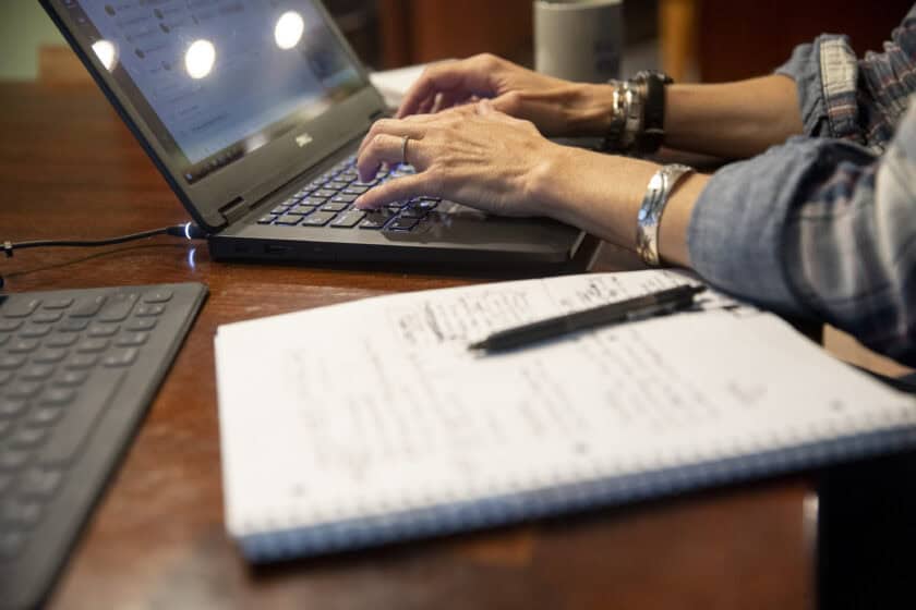A woman works from home in Tiskilwa, Ill.