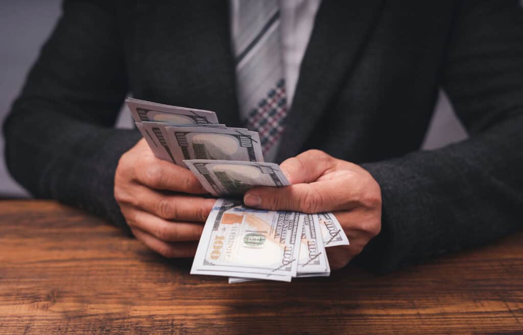 business exec counting money