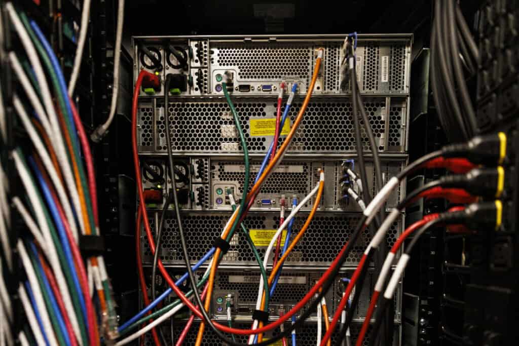 Ethernet connection cables plugged into servers in a storage array